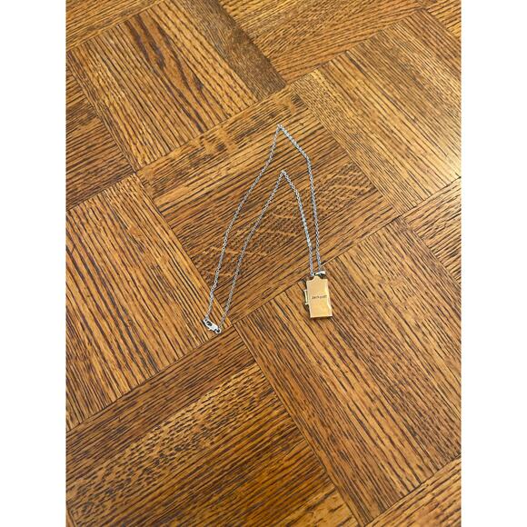 Costume jewelry gambling charm gold town, and silver tone necklace - Picture 4 of 4